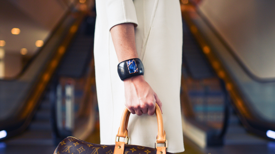 Person Carrying Monogrammed Louis Vuitton Handbag